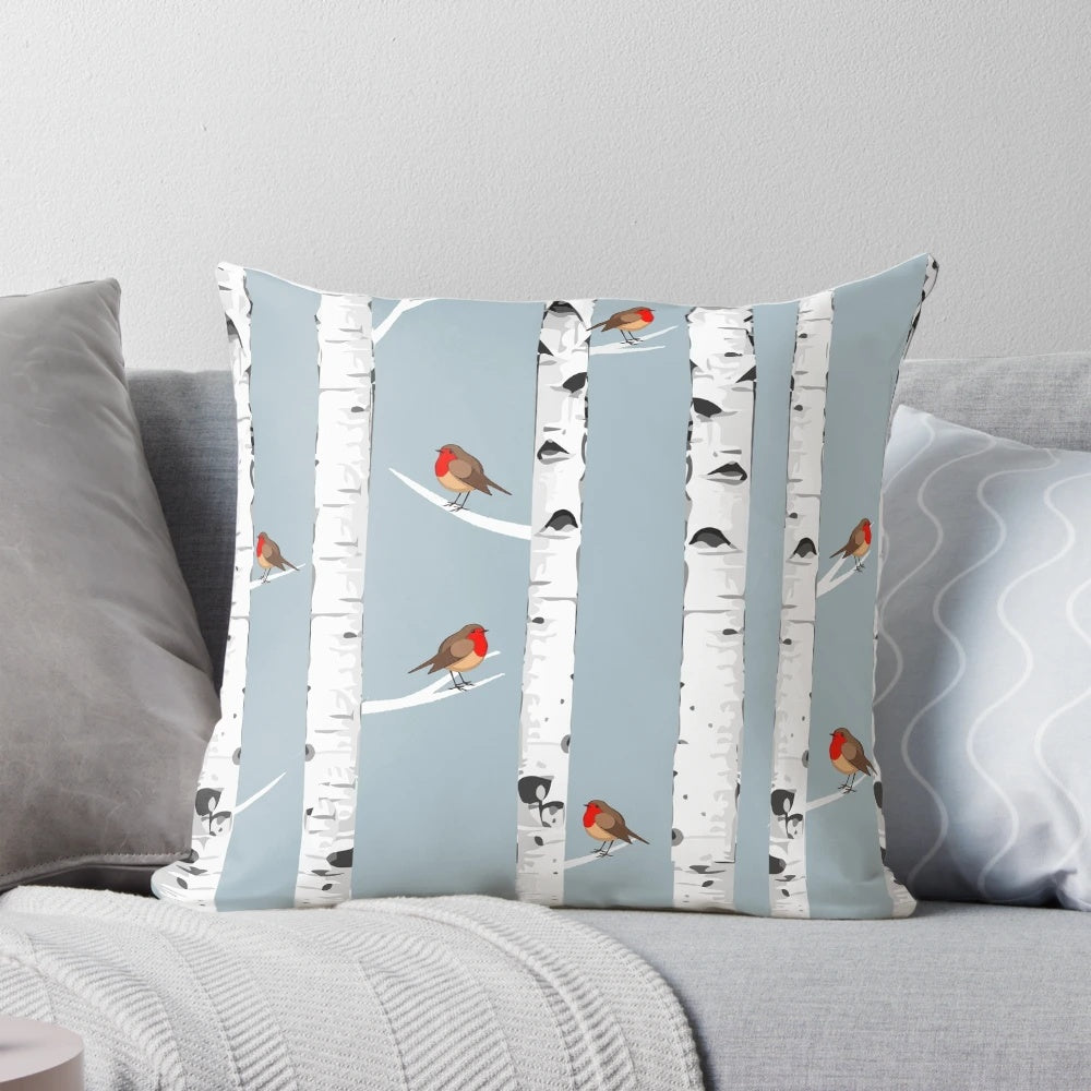 A snowy forest scene featuring birch trees and a robin bird, perfect for nature lovers
