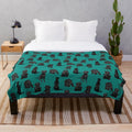 Black labrador retriever dog on a soft, plush blanket