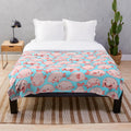 Soft and cuddly plush blanket featuring a cute blobfish pattern design