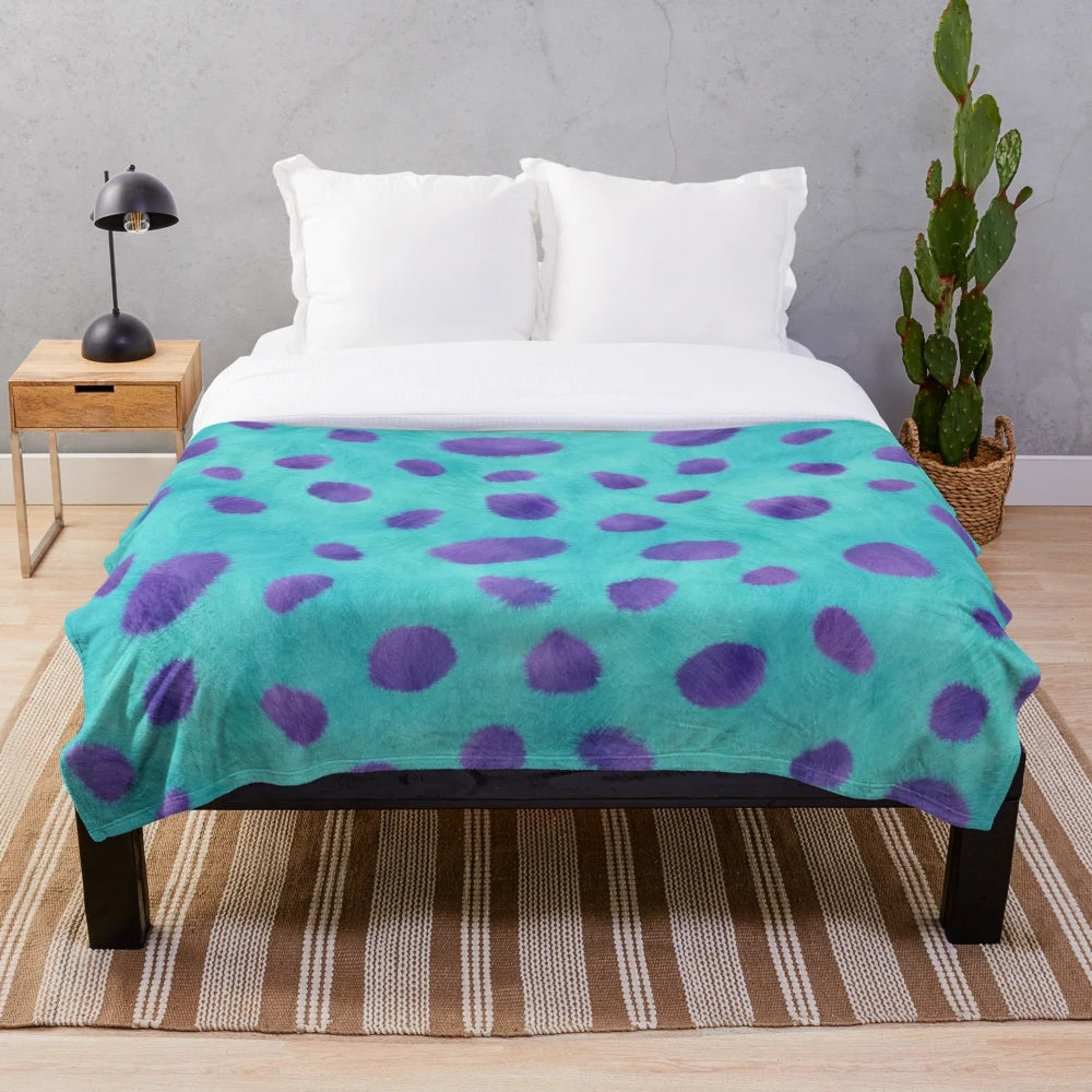 Soft and fluffy blue monster-inspired plush blanket