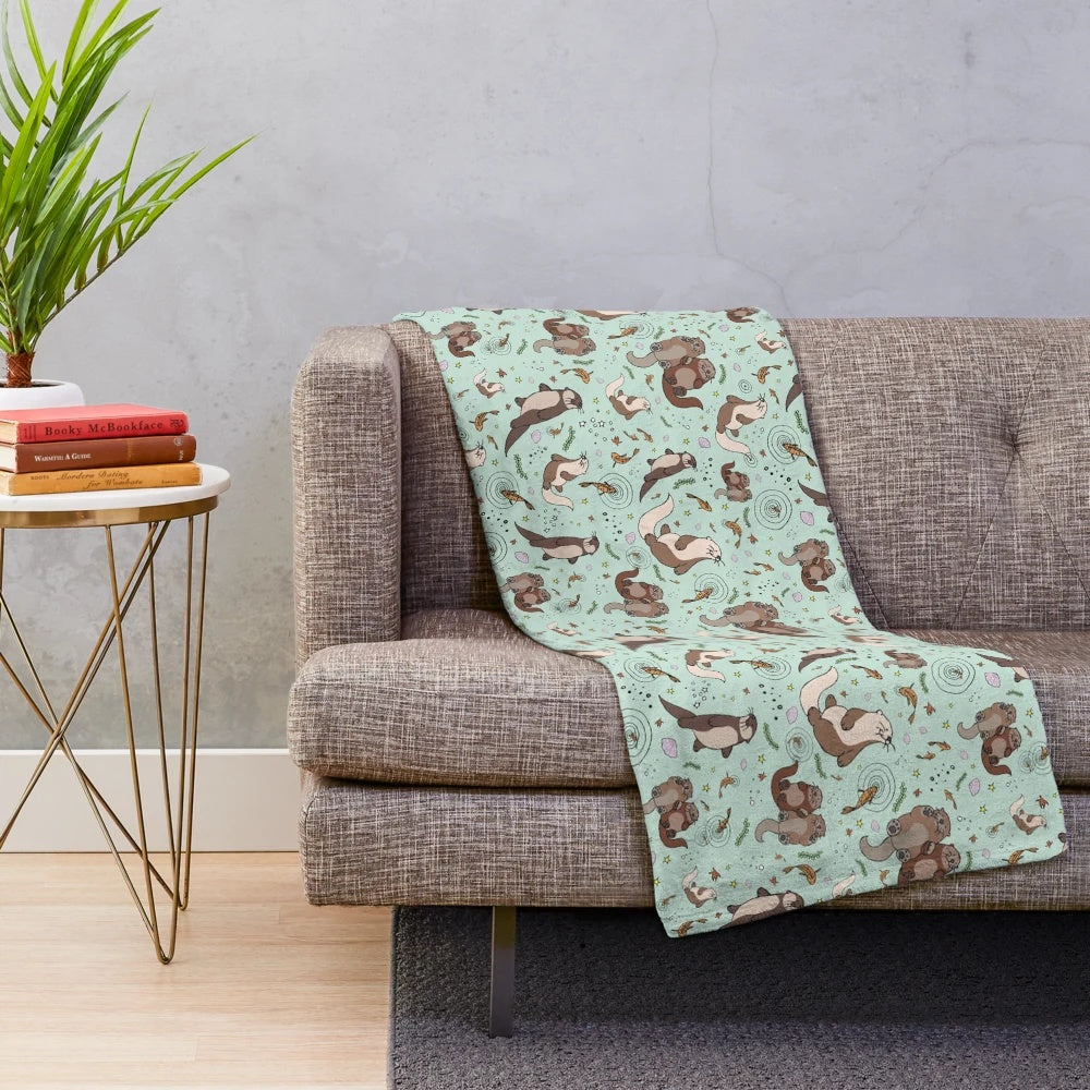 Blue otter plush blanket