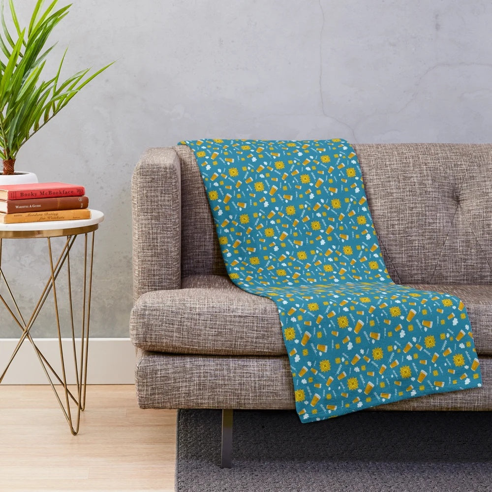 A blue plush blanket perfect for enjoying a summer beer