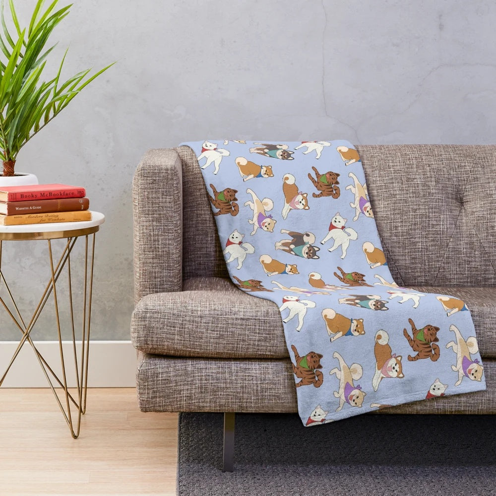 Blue plush blanket featuring a design inspired by Japanese dog breeds