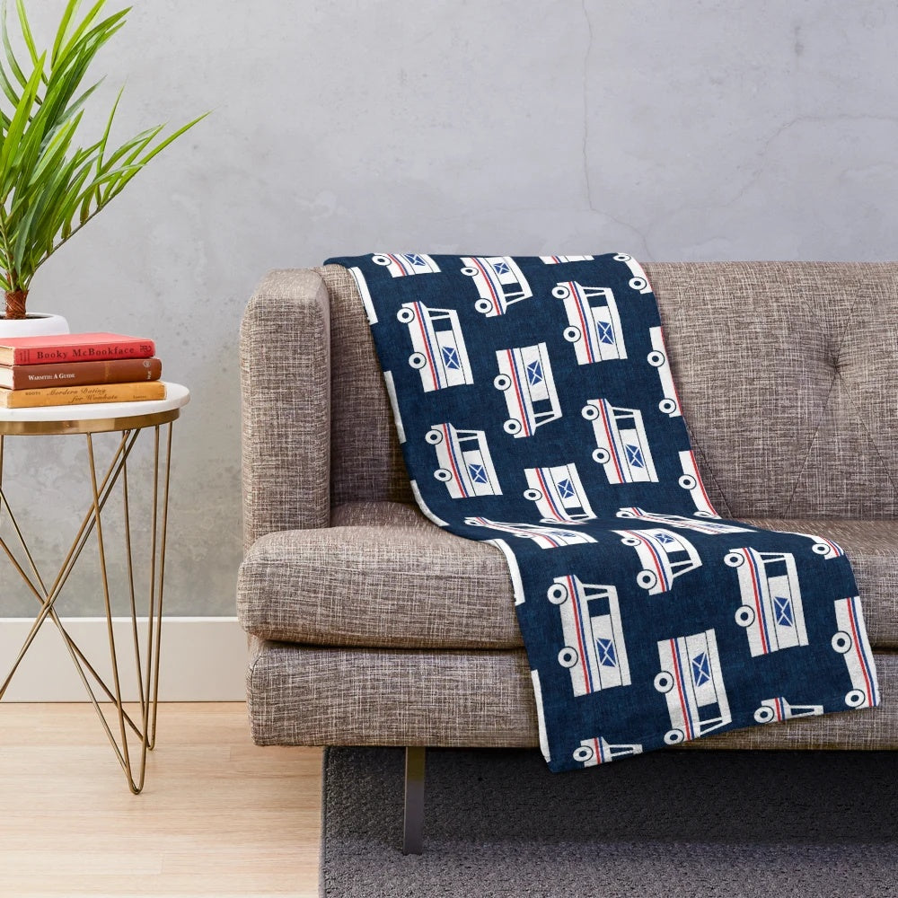 Blue plush blanket with mail truck and mail service design