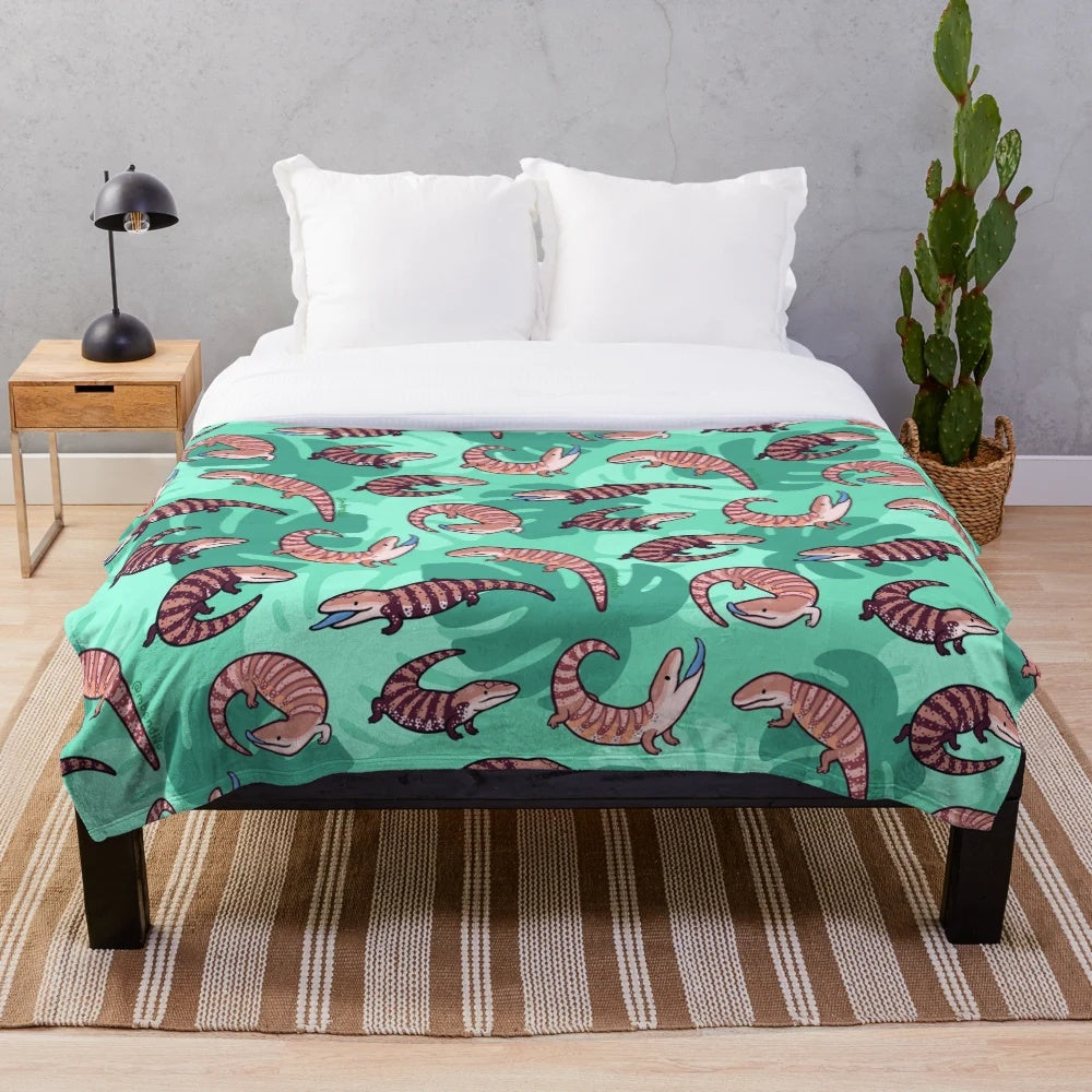 Cozy blue tongue skink plush blanket with a cute, cartoon-like design