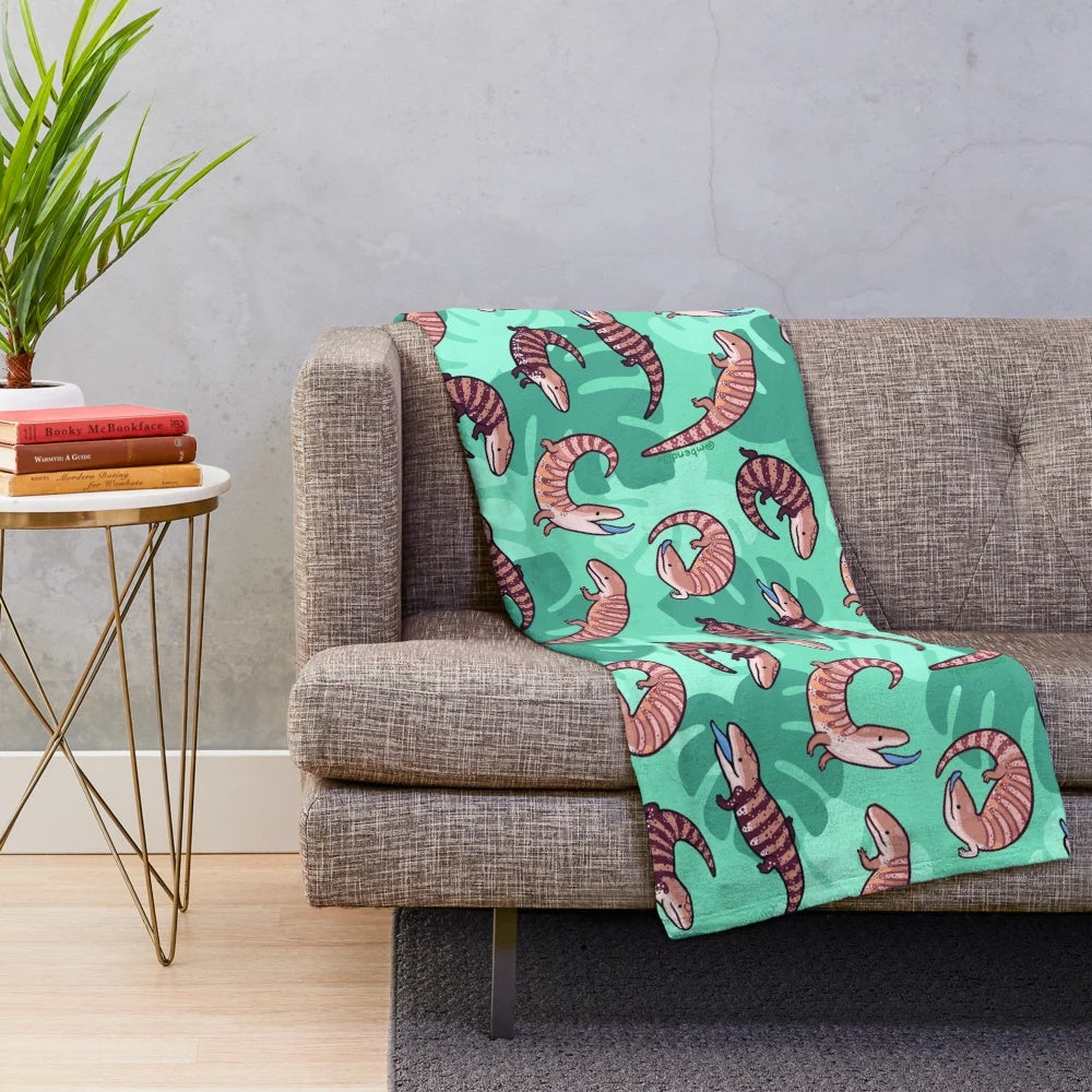 Cozy blue tongue skink plush blanket with a cute, cartoon-like design