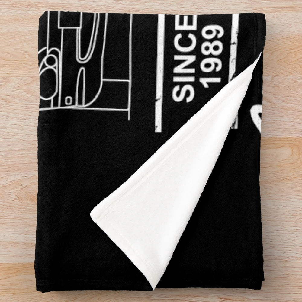 Plush blanket featuring blueprint-inspired design of the Mazda MX-5 Miata sports car