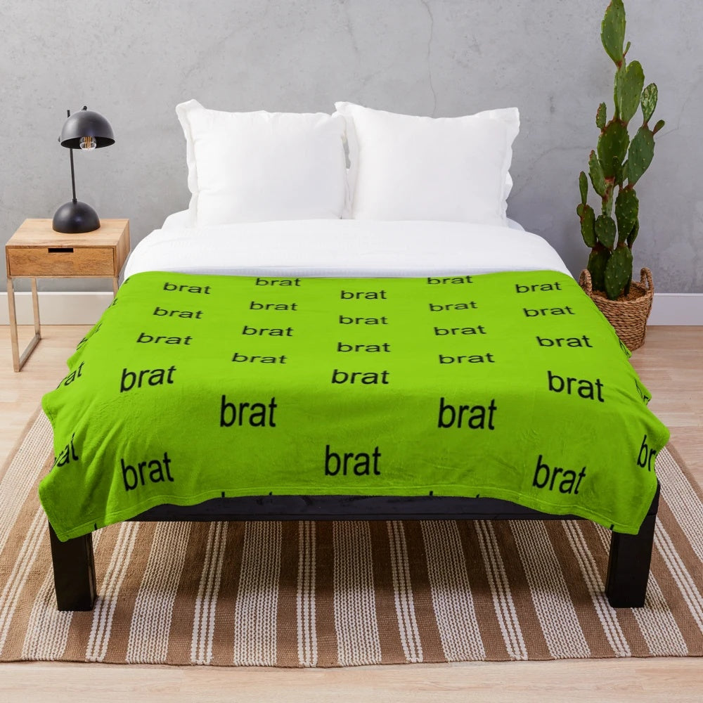 Brat-z plush blanket featuring hyperpop music graphics