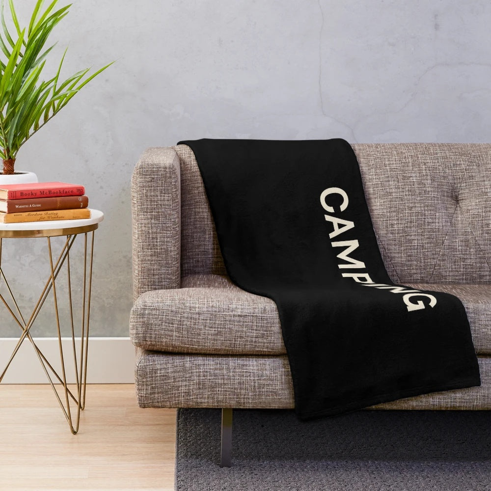 Plush blanket with camping and outdoor adventure design
