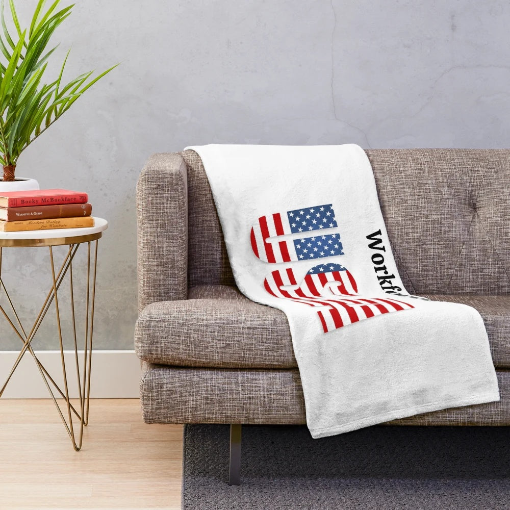 Caregiver holding a plush blanket with a compassionate design