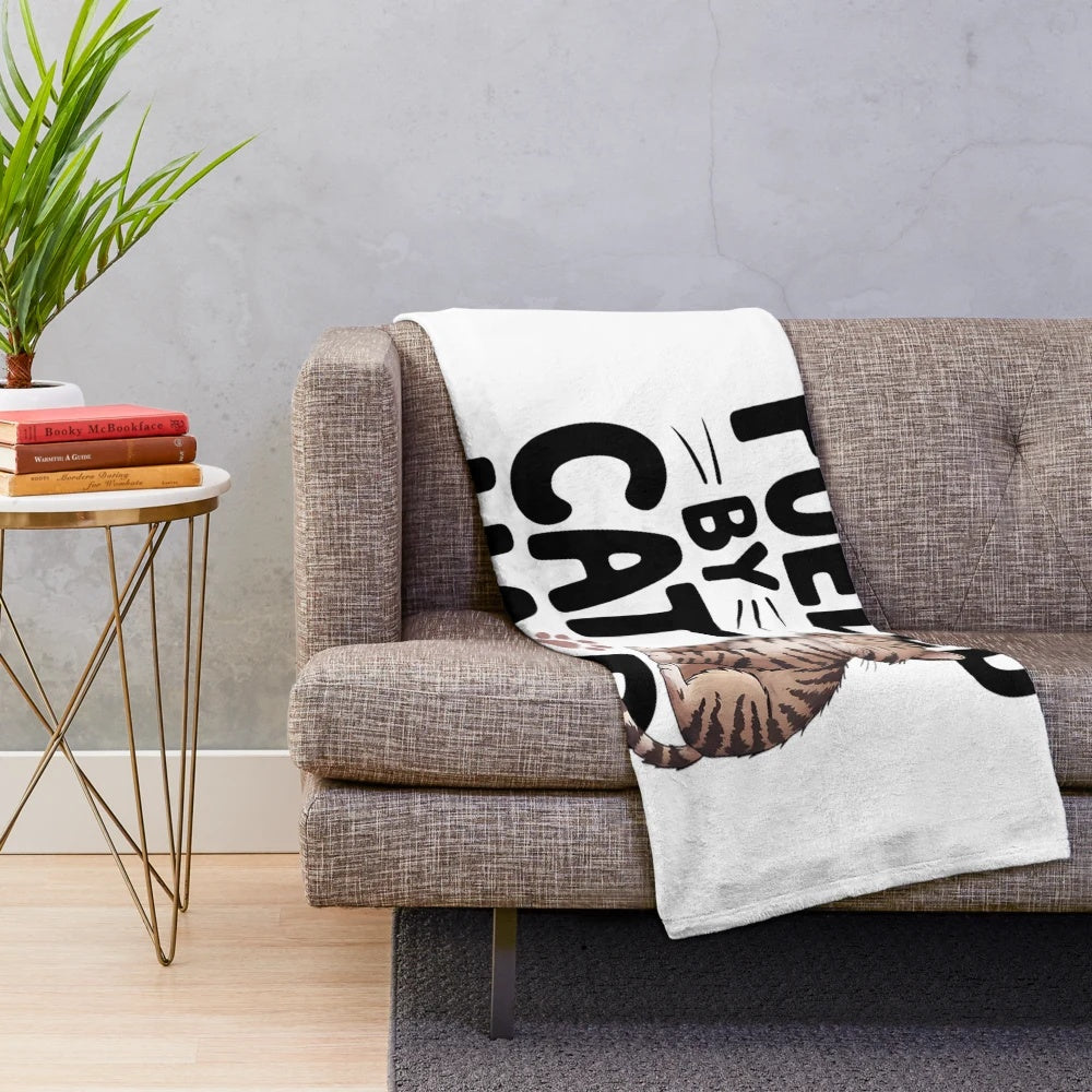 Soft and cuddly plush blanket with a cute cat design