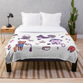 Cozy cats plush blanket featuring kawaii chibi cats engaged in hobbies like gardening, baking, and knitting