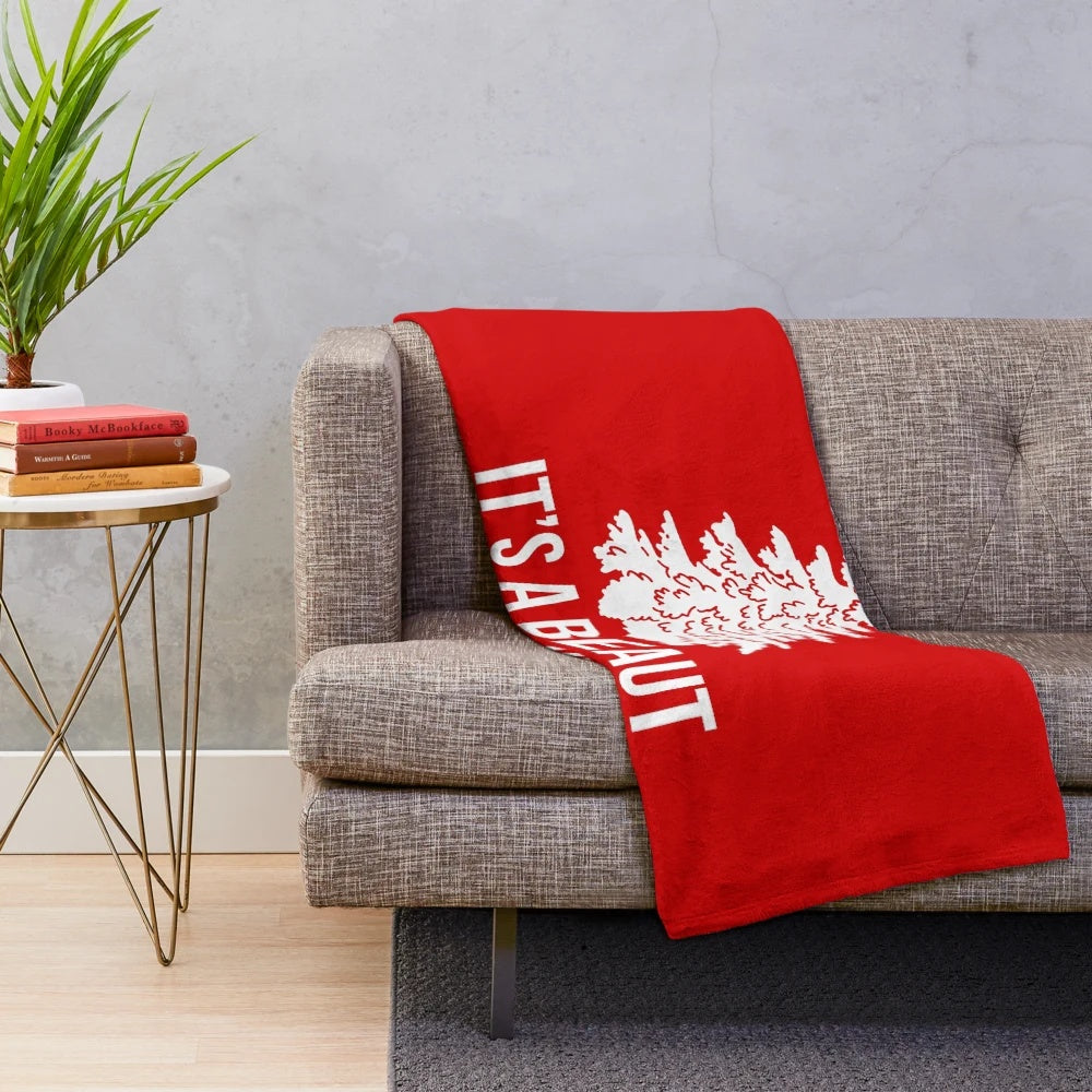 Cozy plush blanket with classic Christmas movie design
