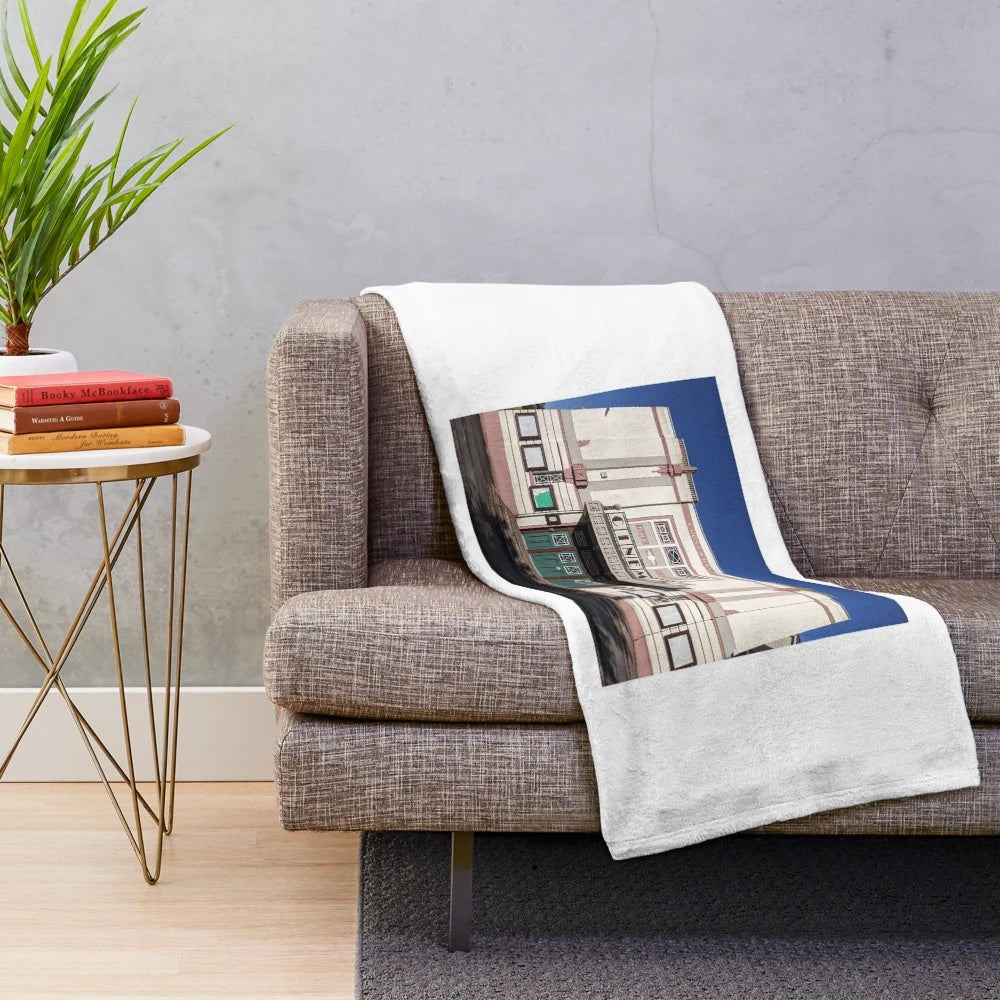 Cross Hands Cinema-themed plush blanket with retro movie theater design