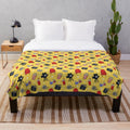 Cinema-themed plush blanket with a whimsical pattern