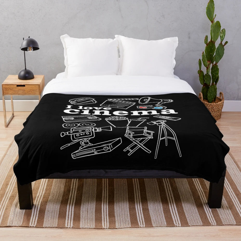 Plush cinema-themed blanket for movie enthusiasts