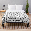 Soft and plush black and white patterned blanket for cinema enthusiasts