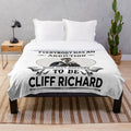 Soft and cuddly plush blanket featuring the iconic Cliff Richard from the classic TV show The Young Ones