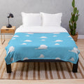 Cozy plush blanket featuring clouds, inspired by the popular Toy Story franchise