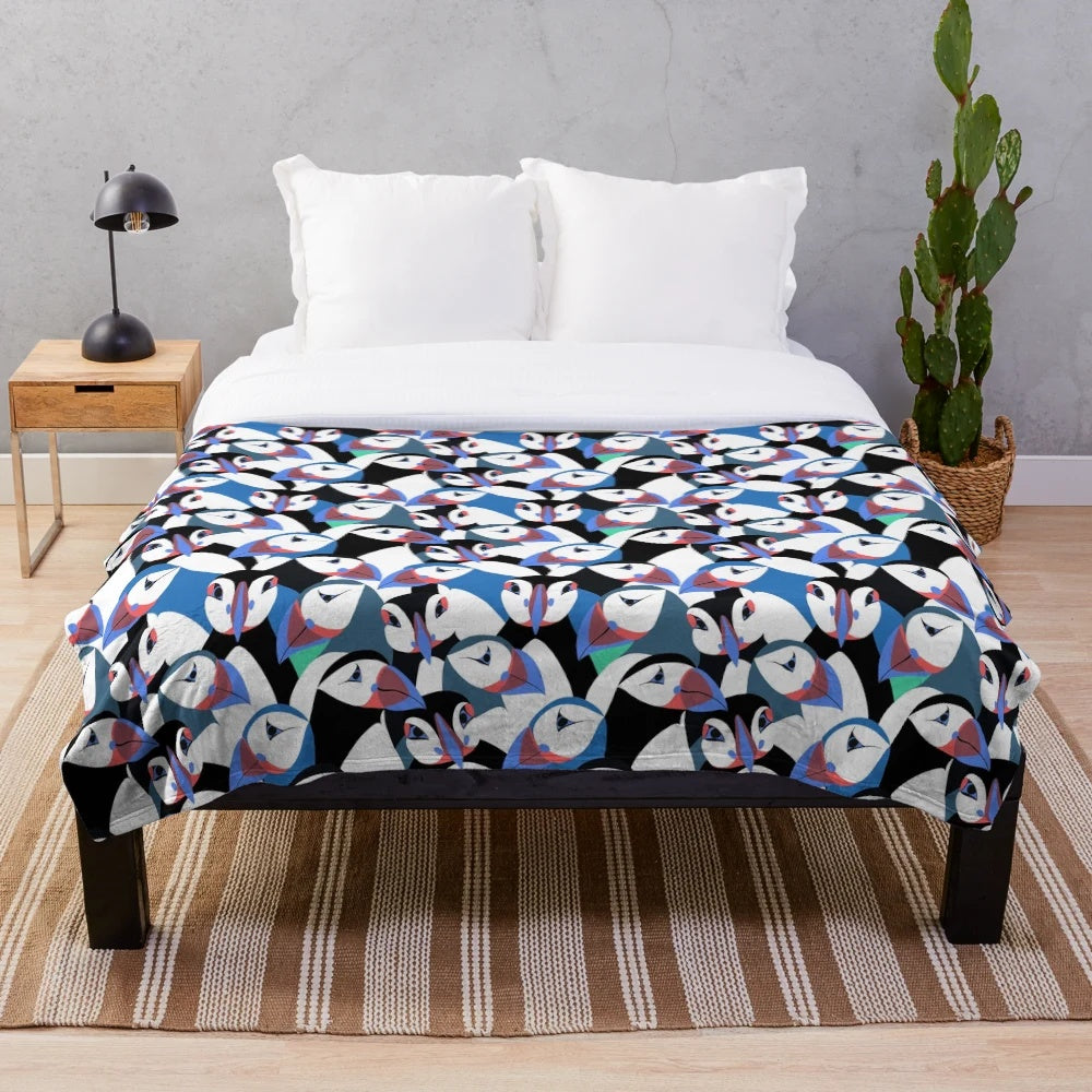 Soft and cuddly blue puffin plush blanket