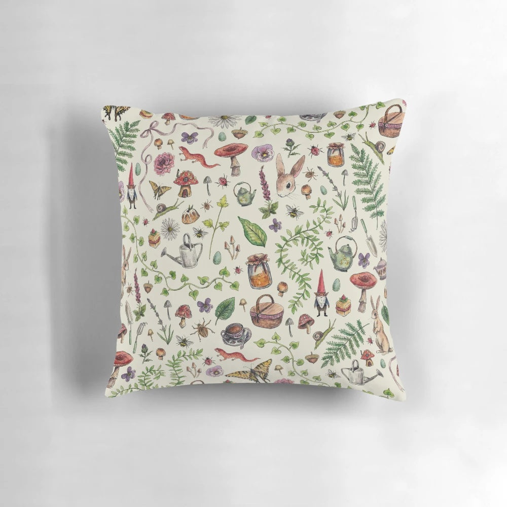 A soft, light green pillow with a cozy, cottagecore-inspired design featuring nature-inspired elements.