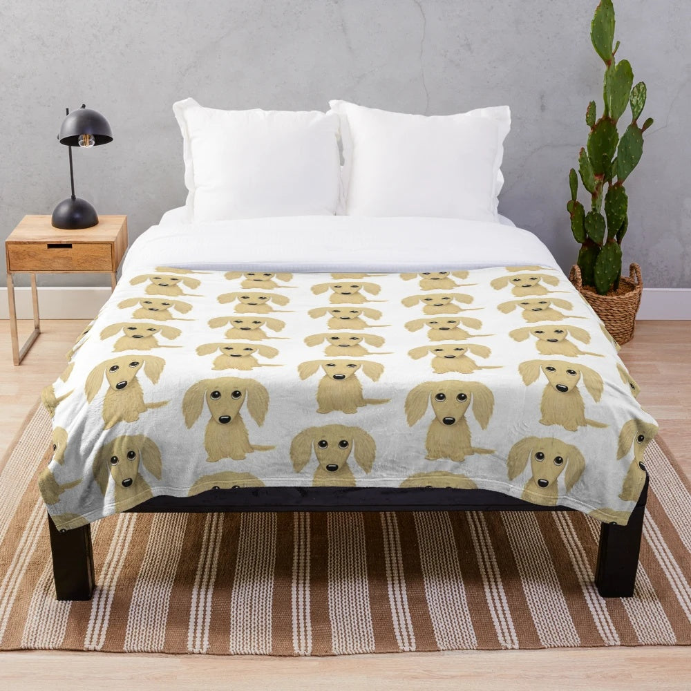 Longhaired cream dachshund cartoon design on a soft plush blanket