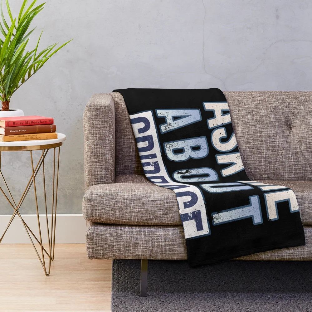 Plush blanket with cribbage-inspired design and text