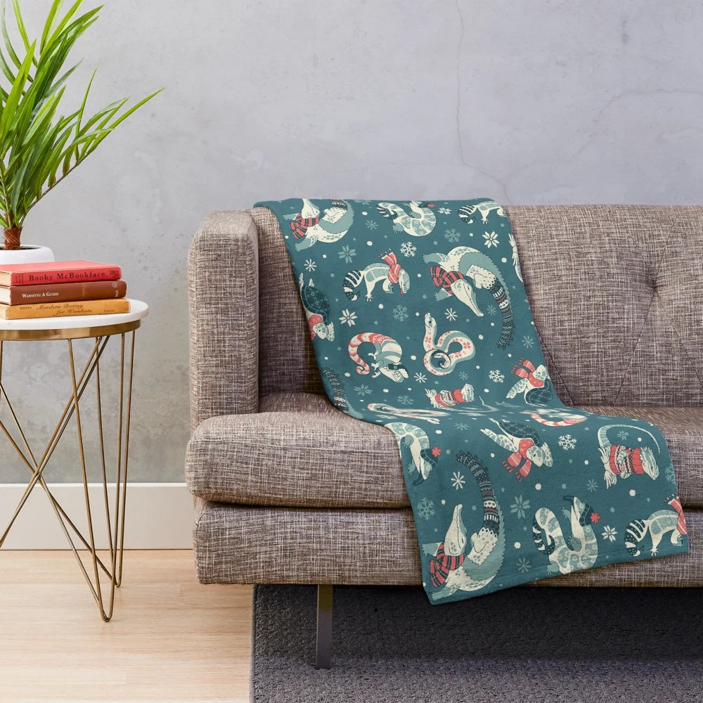 Dark blue plush blanket with reptile pattern design