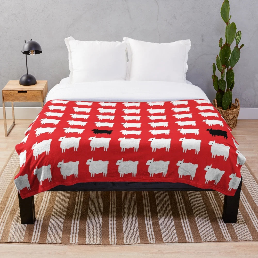 Plush blanket featuring a cozy black sheep jumper design inspired by Princess Diana