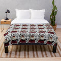 Doma-inspired black and white plush blanket