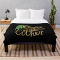 Plush dragon-themed blanket with a whimsical design