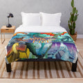 Soft and cozy dragon plush blanket with characters from the Wings of Fire book series