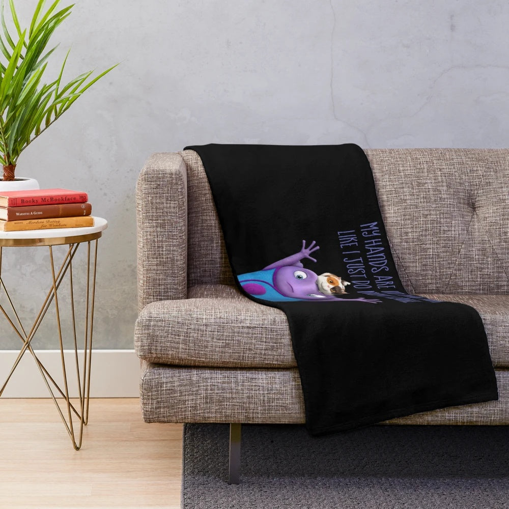 Dreamworks-inspired plush blanket with cartoon aliens and vibrant colors