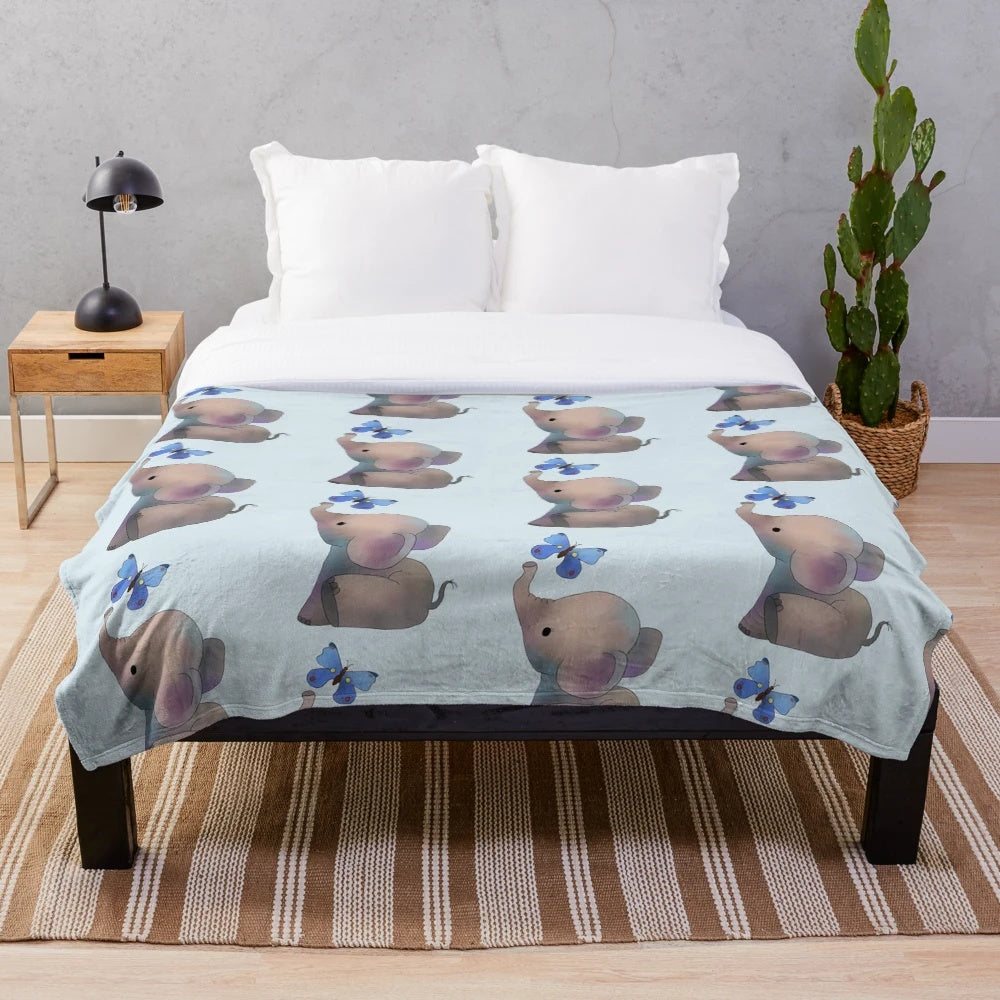 Soft blue elephant with butterfly print plush blanket