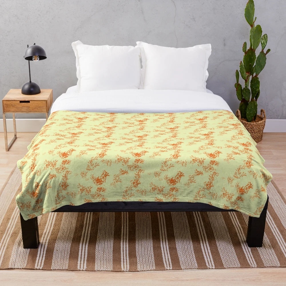 Soft and cozy fall plush blanket in warm colors