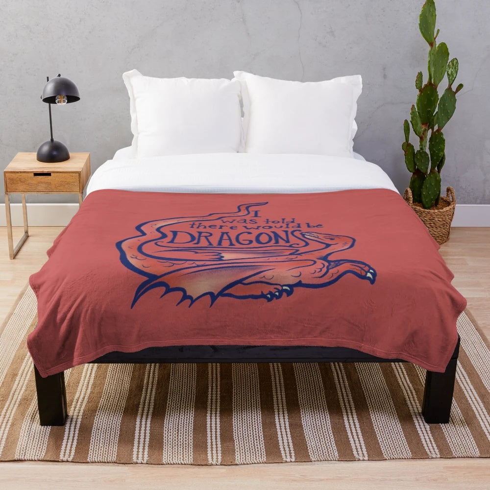 Soft and plush red dragon blanket for fantasy fans