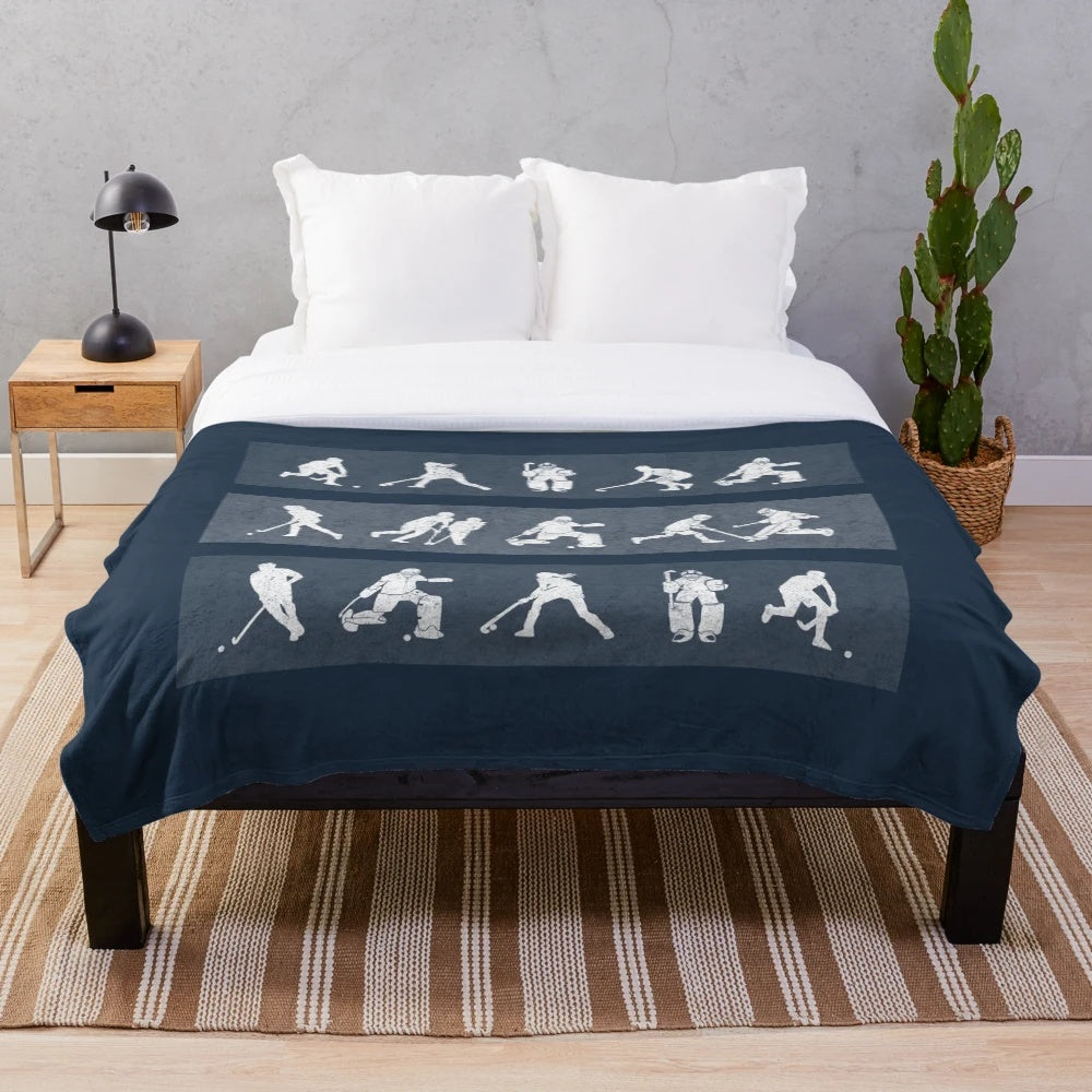 Field hockey plush blanket featuring hockey goalkeeper design