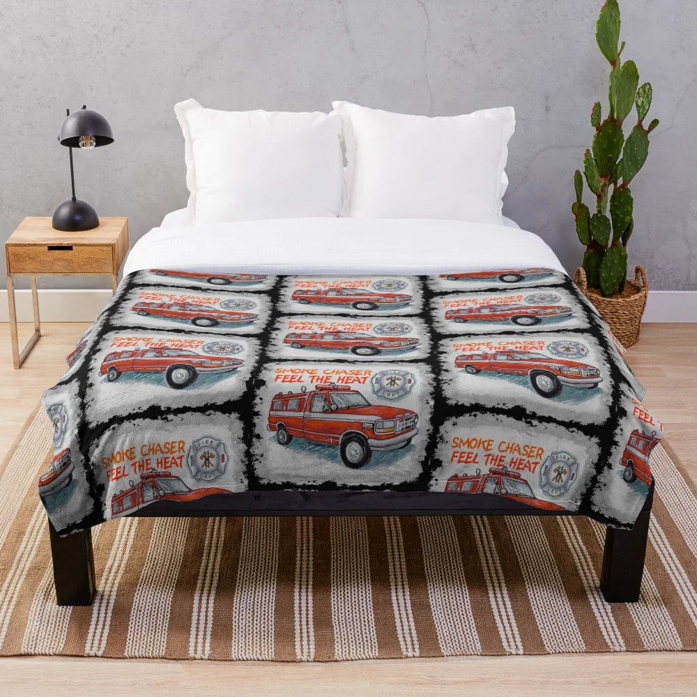 Firefighter-themed plush blanket with fire truck and emergency services design