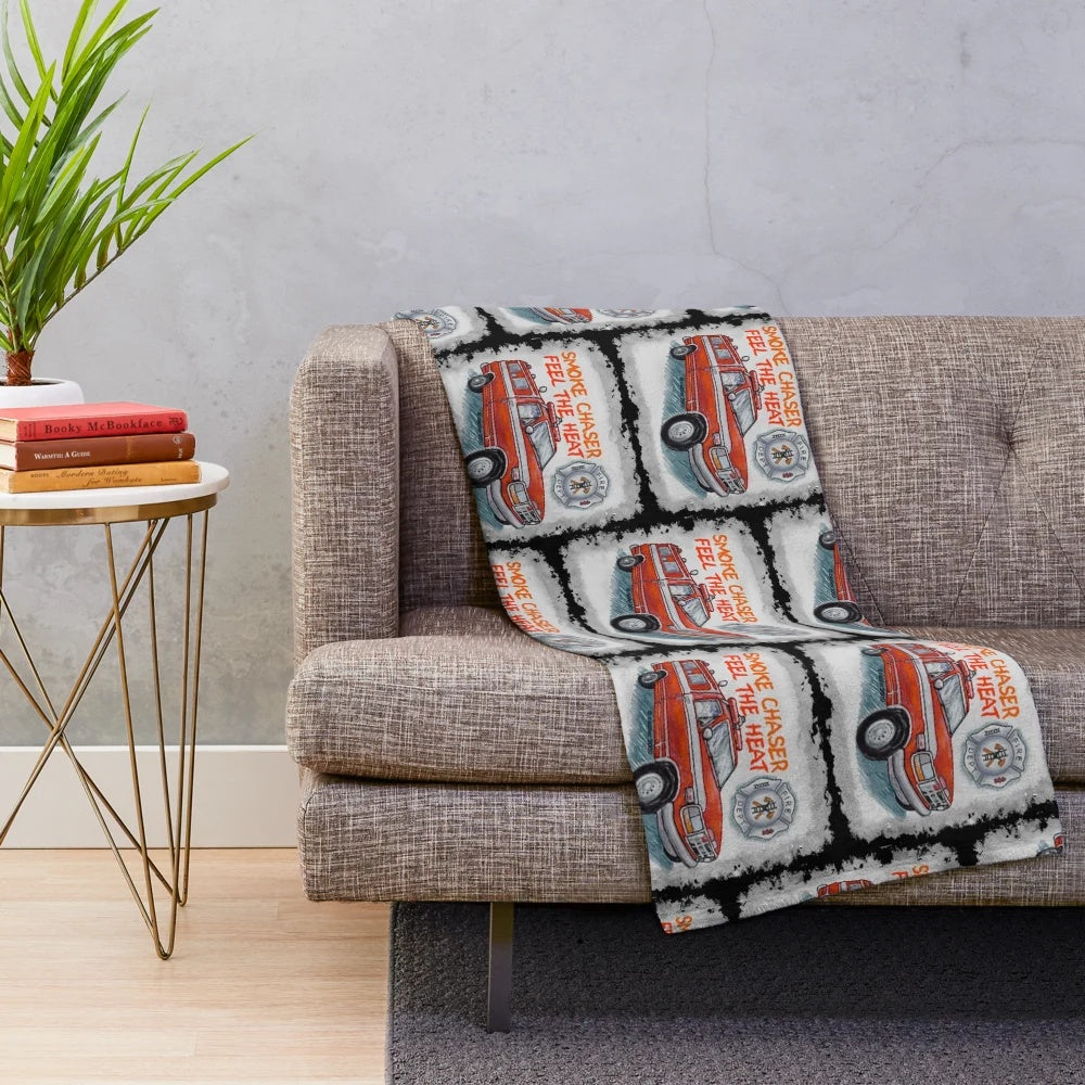 Firefighter-themed plush blanket with fire truck and emergency services design