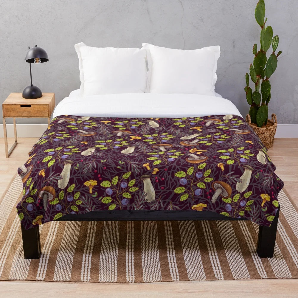 Forest-inspired plush blanket with nature-themed pattern