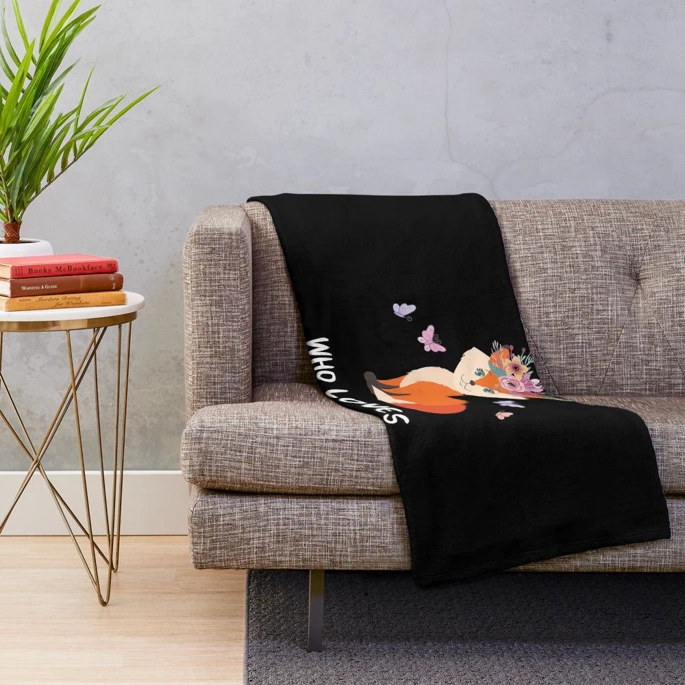 Plush fox blanket with floral wreath design, perfect for fox lovers
