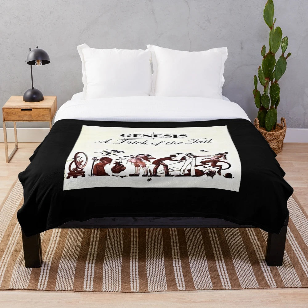 Genesis plush blanket featuring the iconic band's album artwork