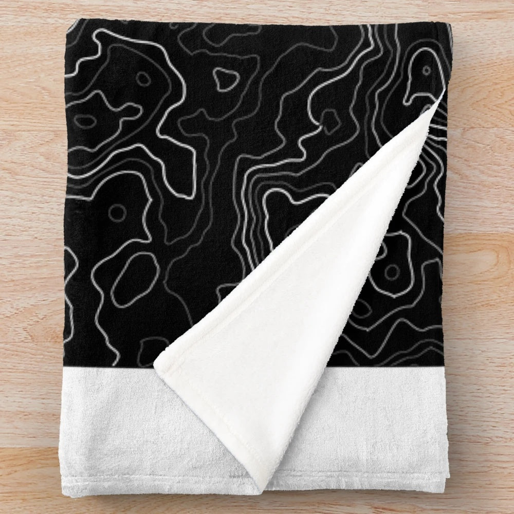 Geometric abstract plush blanket with mountain landscape design