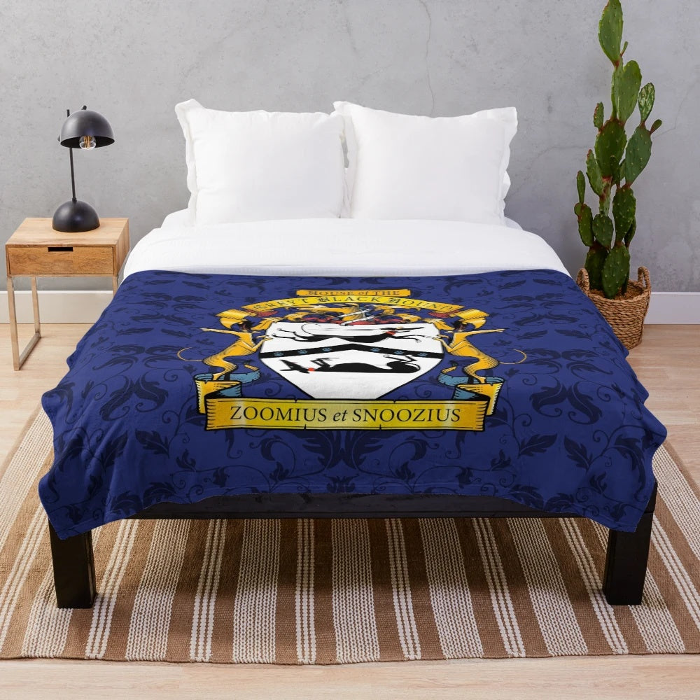 Greyhound plush blanket with heraldic-inspired black dog design