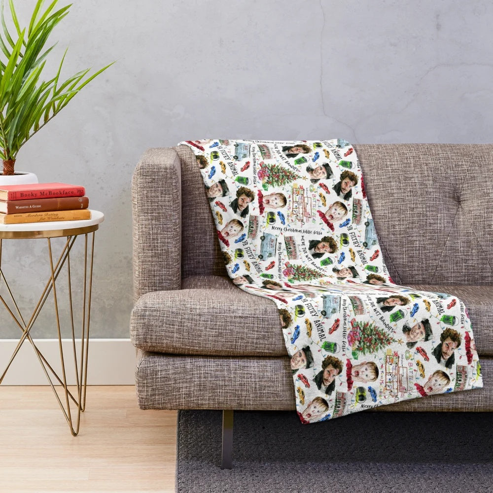 Plush blanket with Christmas movie-inspired pattern featuring Kevin McCallister from Home Alone