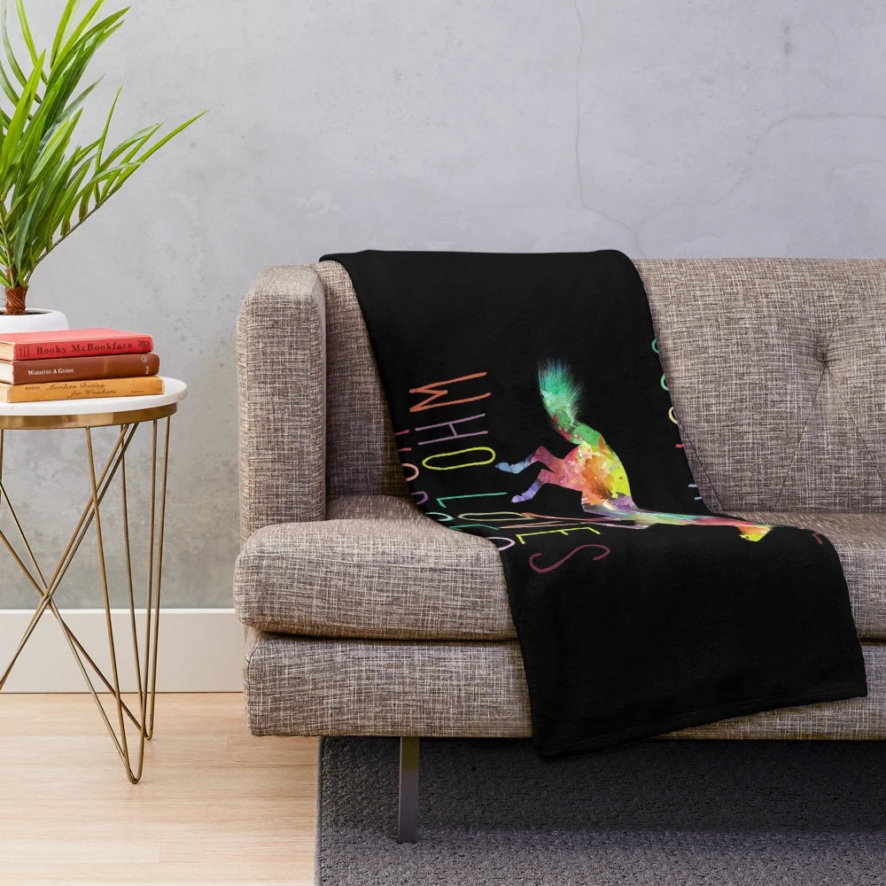 A soft and plush blanket featuring a horse design for horse lovers