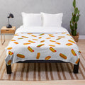 Plush blanket with a fun hot dog pattern design