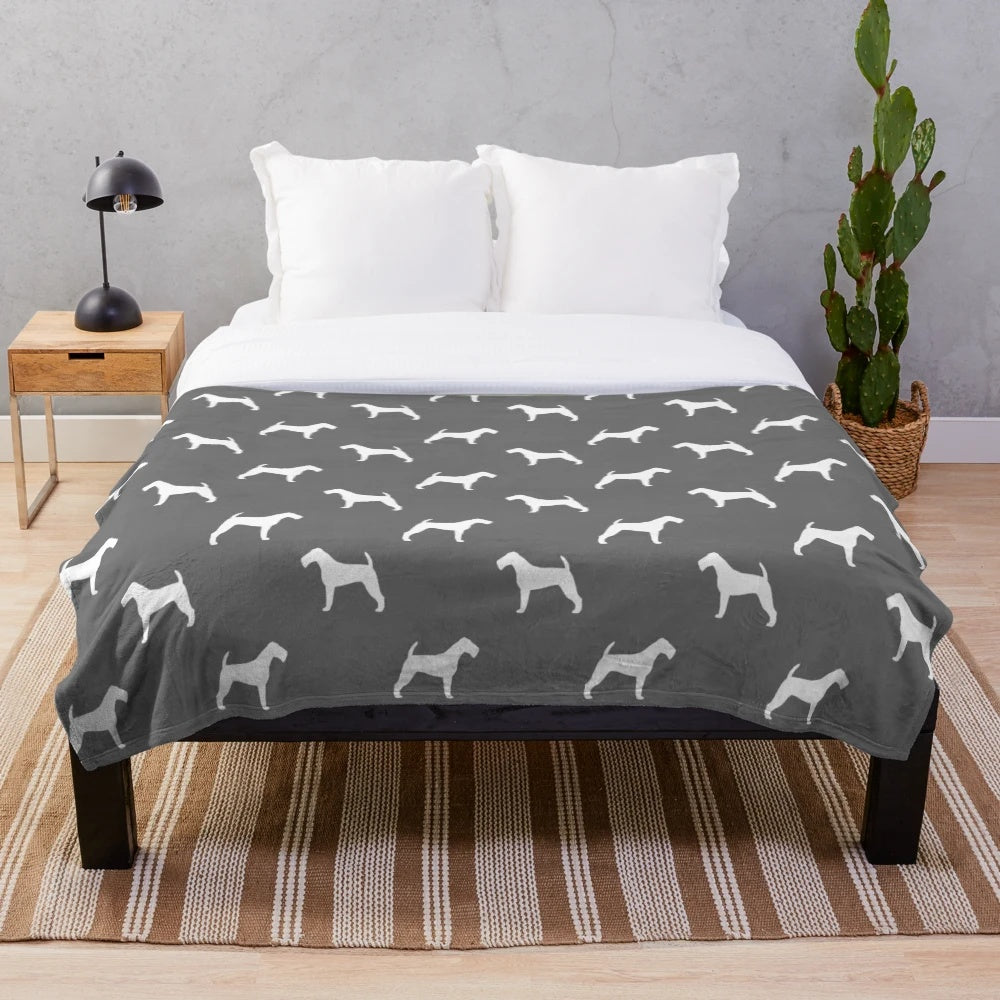 Irish Terrier silhouette design on a plush, soft blanket