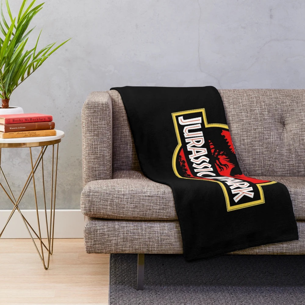 Jurassic Park inspired plush blanket with dinosaur design