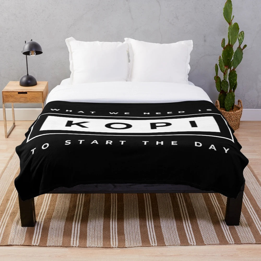 Cozy Kopi-themed plush blanket for coffee enthusiasts